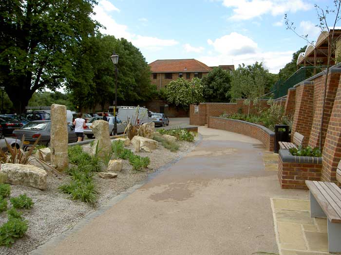 The rock garden and seats.